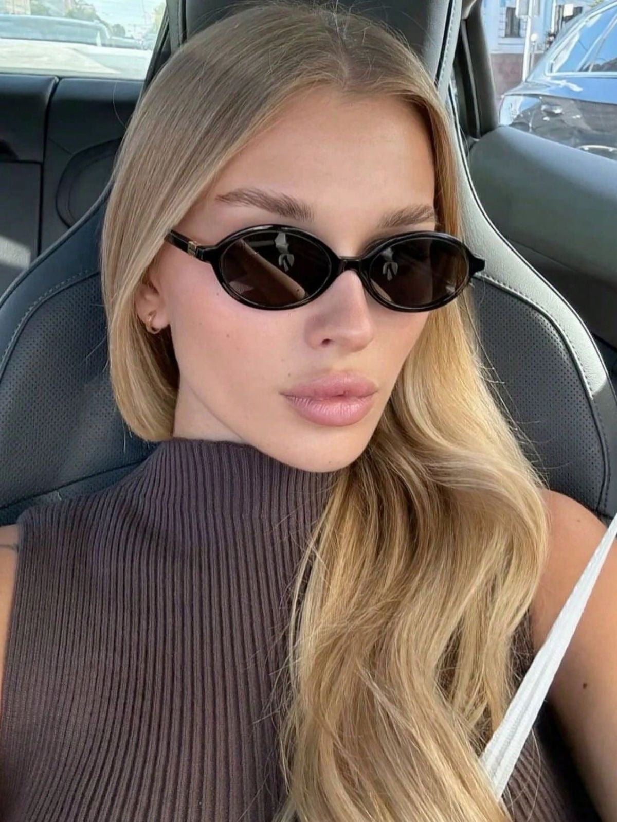 Miu Miu Oval Sunglasses (Black)