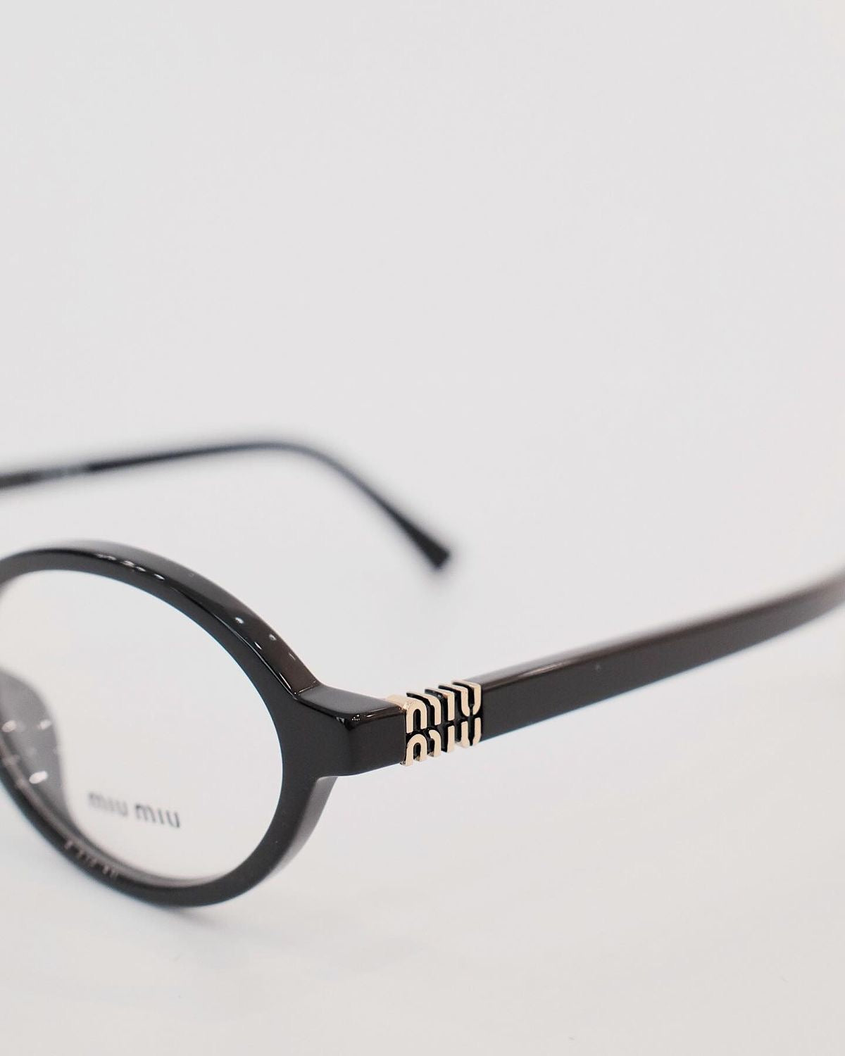 Miu Miu Oval Transparent Sunglasses (Black)