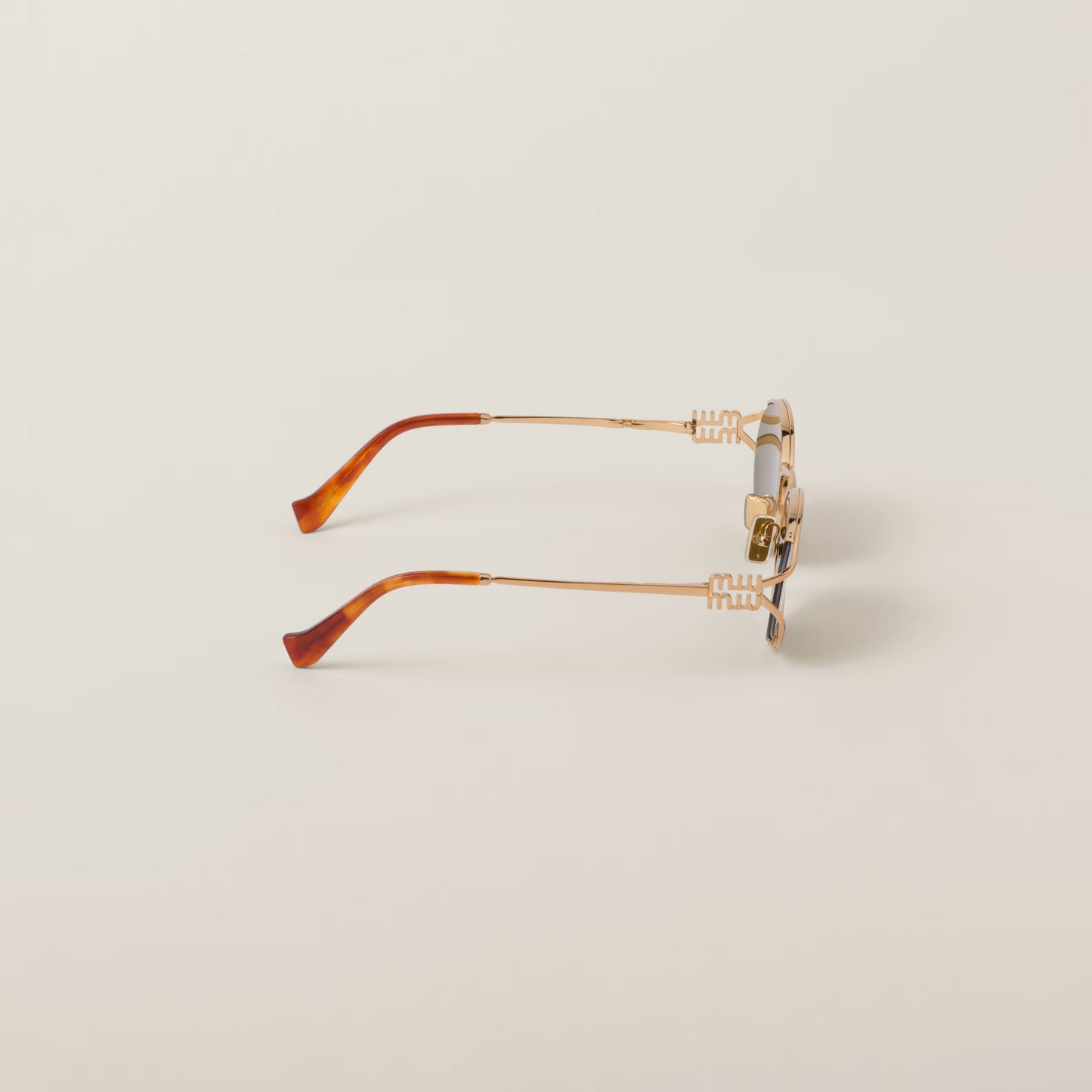 Miu Miu Metal Frame Sunglasses