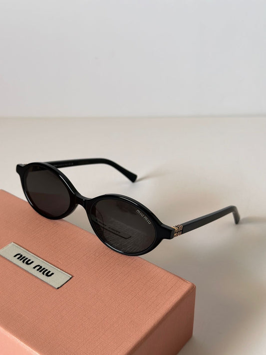 Miu Miu Oval  Sunglasses (Black)
