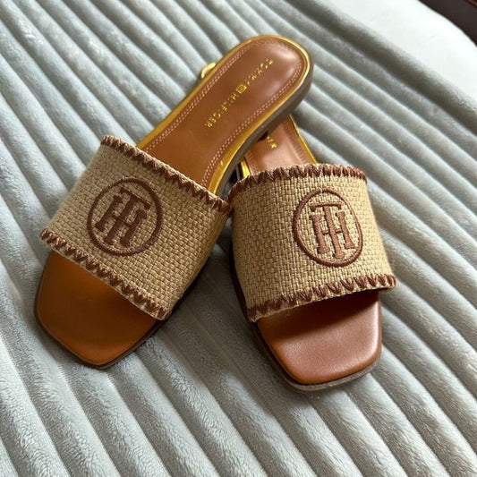 The tomy slides in brown sand