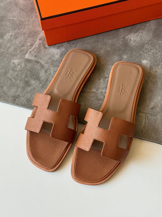 The H slides in brown