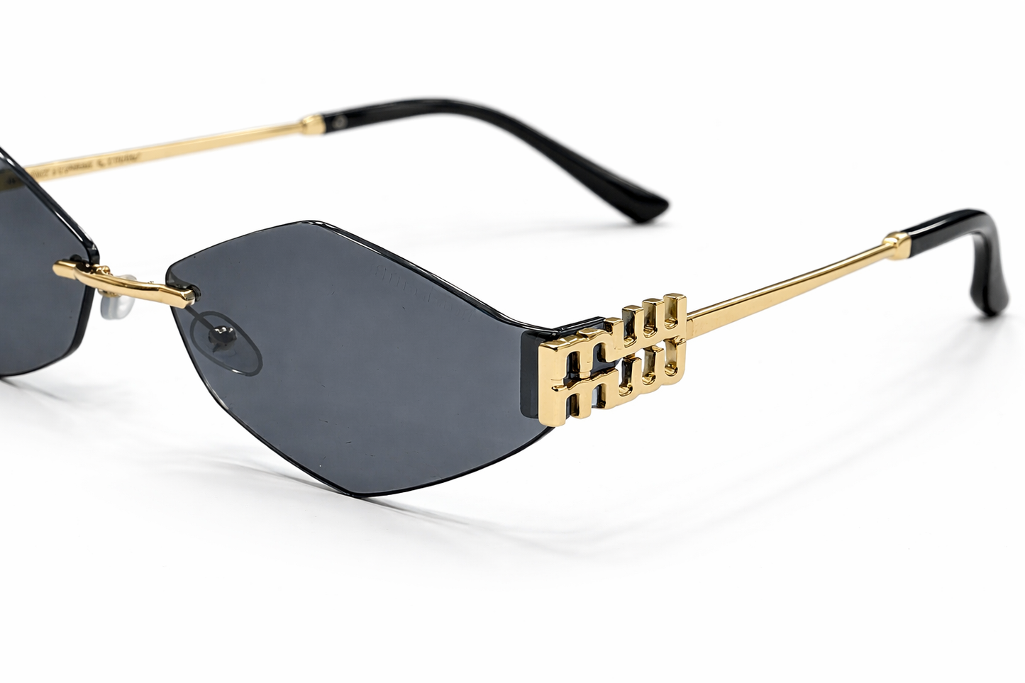 MIU MIU Geometric Rimless Gold Sunglasses
