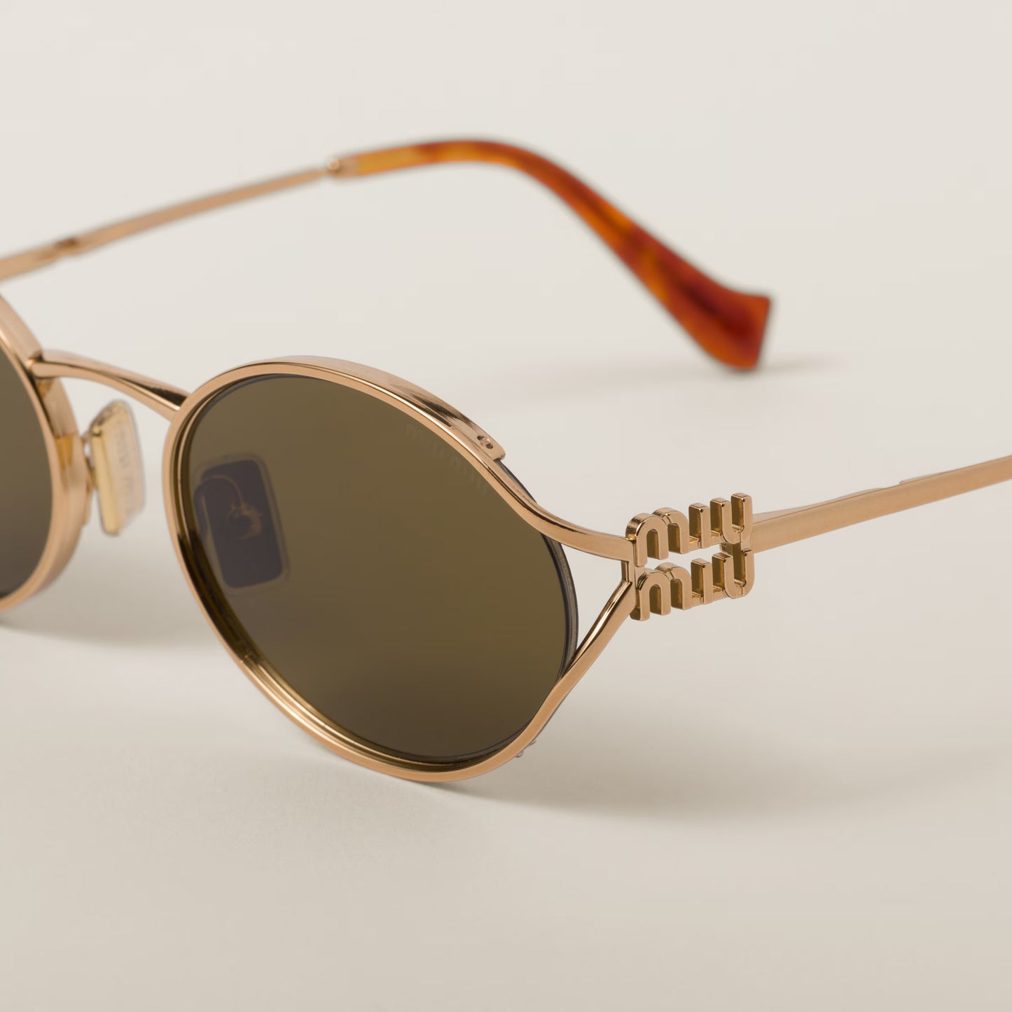 Miu Miu Metal Frame Sunglasses
