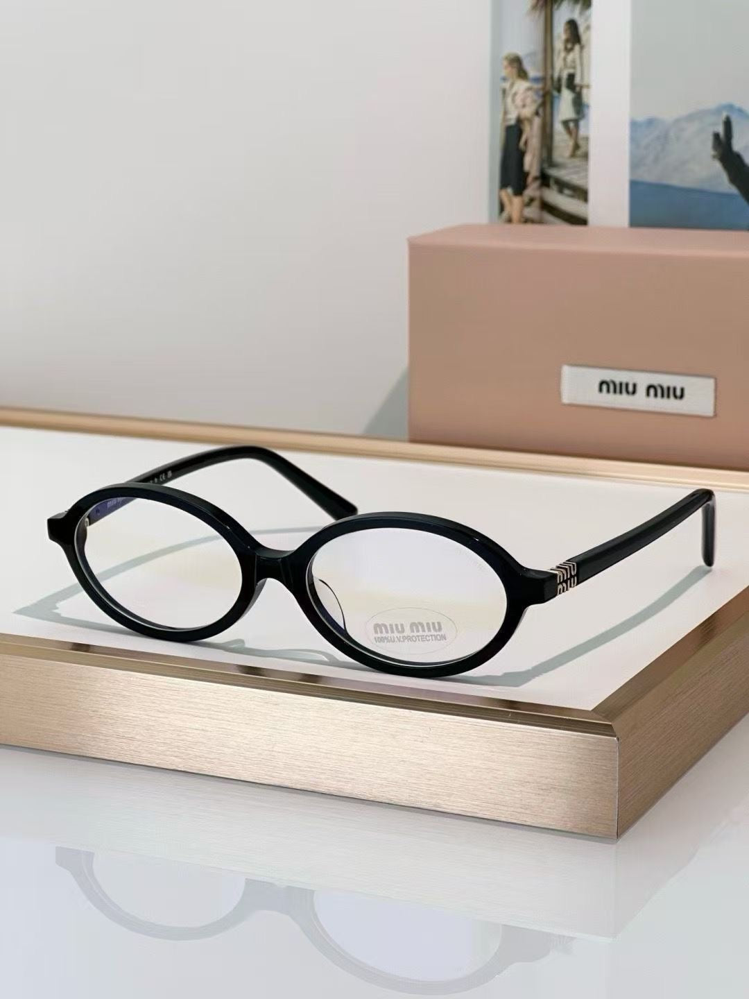 Miu Miu Oval Transparent Sunglasses (Black)