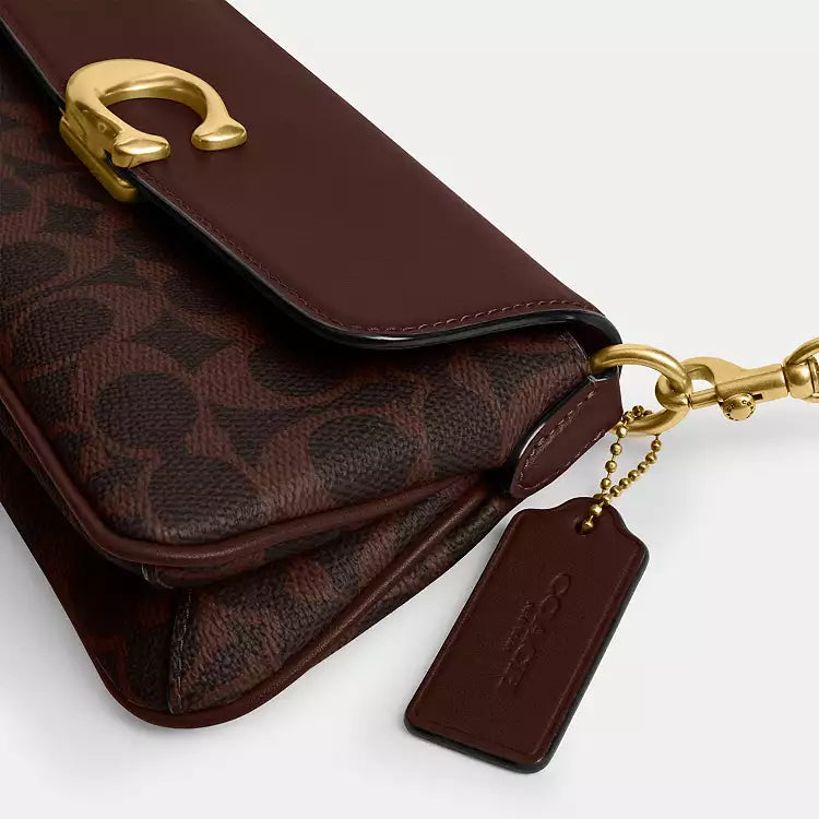 COACH Jet Shoulder Bag
In Signature Canvas - Brass/Maple
